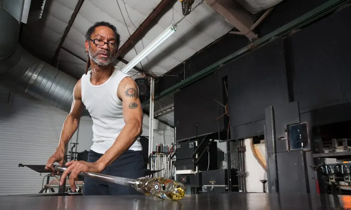 An artisan inspecting the final product.